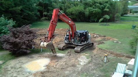 digging pool with mini excavator|time lapse digging for a pool.